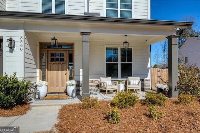 entrance to property featuring covered porch