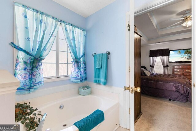 1800 Rockdale Cir, Snellville, GA 30078 - full bath with ensuite bathroom, a garden tub, and a ceiling fan
