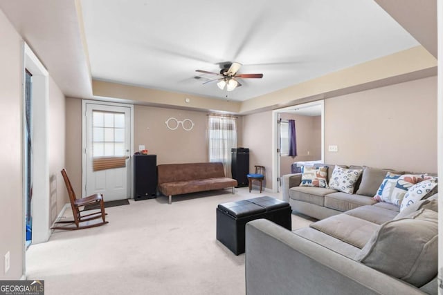 1800 Rockdale Cir, Snellville, GA 30078 - living room with a ceiling fan, a healthy amount of sunlight, and light carpet