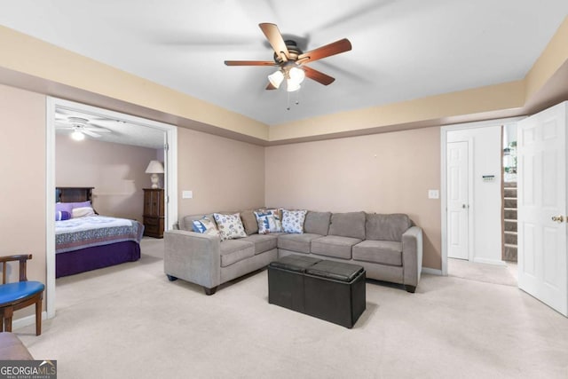 1800 Rockdale Cir, Snellville, GA 30078 - living room featuring carpet flooring, ceiling fan, stairway, and baseboards