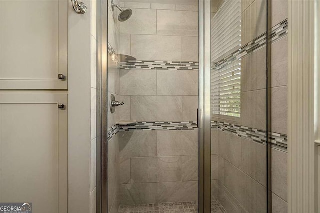 bathroom featuring a stall shower