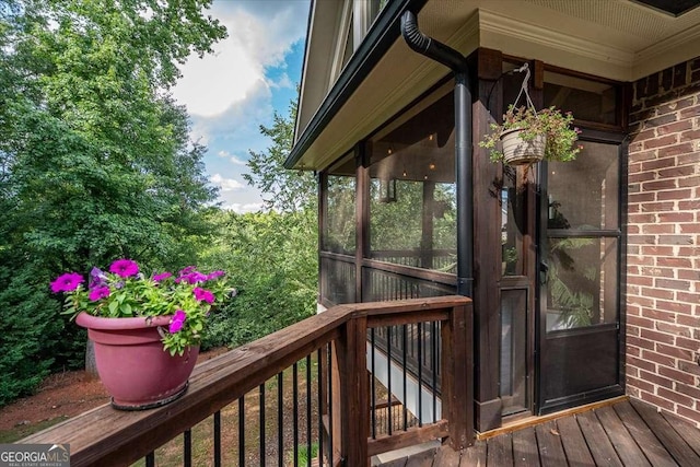 deck with a sunroom