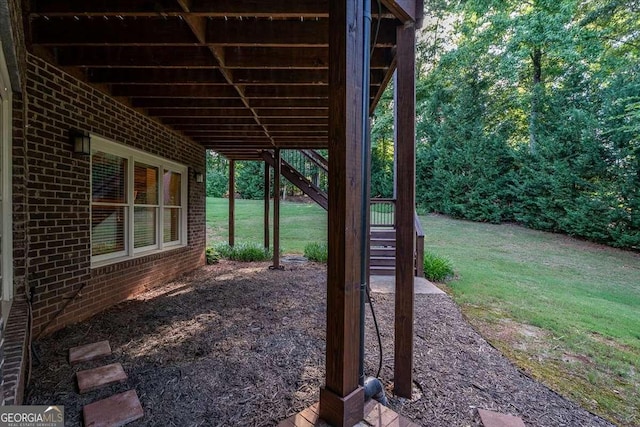 view of yard featuring stairs