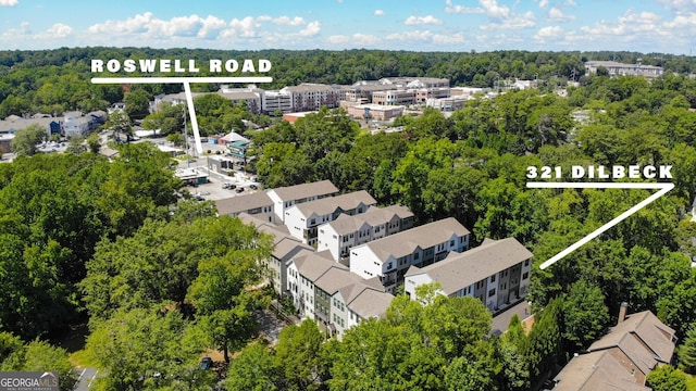 birds eye view of property with a residential view