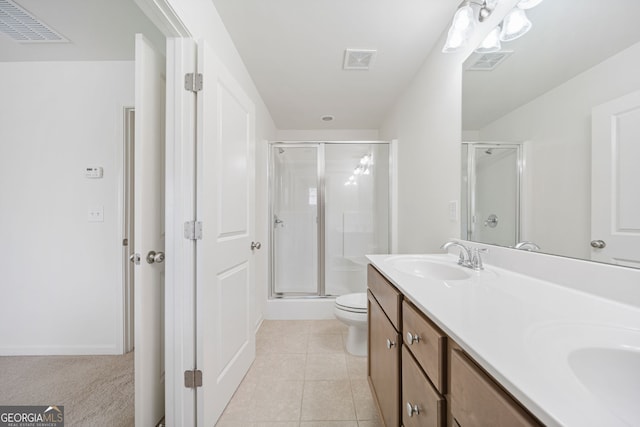 full bath featuring visible vents, a sink, a shower stall, and tile patterned floors