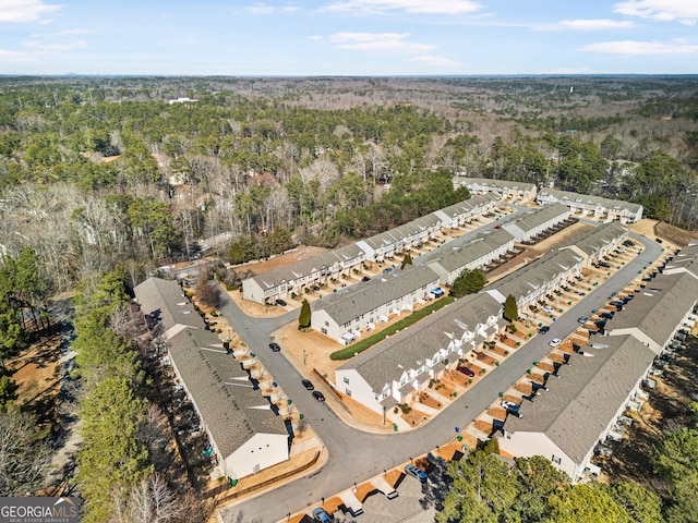 bird's eye view with a forest view