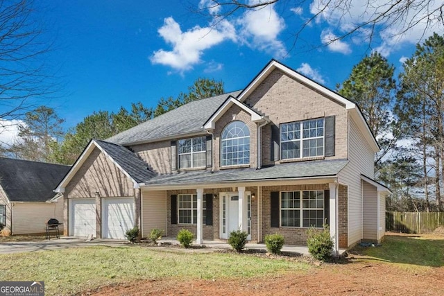 traditional-style home featuring a porch, concrete driveway, brick siding, and an attached garage