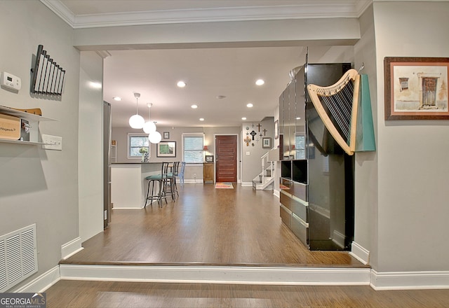 1453 Midview Dr, Decatur, GA 30032 - interior space with wood finished floors, visible vents, baseboards, stairway, and crown molding