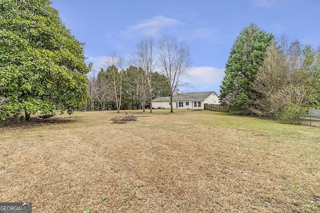 view of yard featuring fence