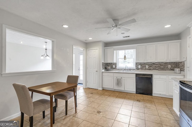 kitchen with black dishwasher, white cabinets, a sink, and decorative backsplash