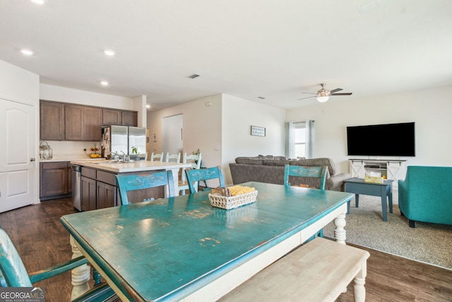 dining room featuring a ceiling fan, recessed lighting, dark wood-style flooring, and visible vents