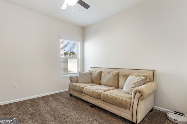 carpeted living room with a ceiling fan and baseboards