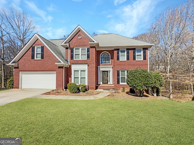 view of front of home featuring concrete driveway, brick siding, and a front yard