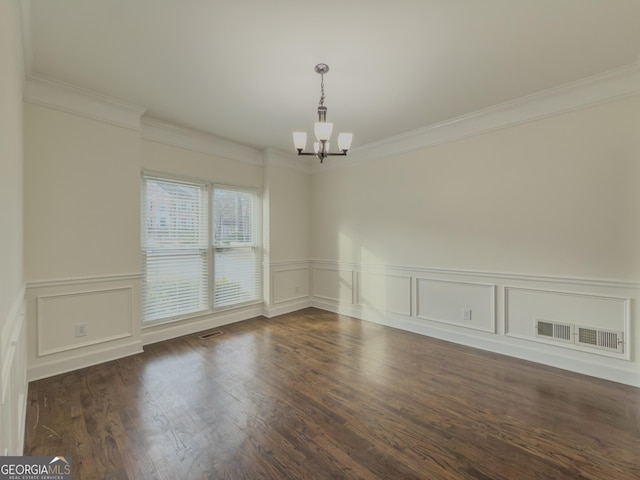 unfurnished room featuring ornamental molding, wood finished floors, visible vents, and a notable chandelier