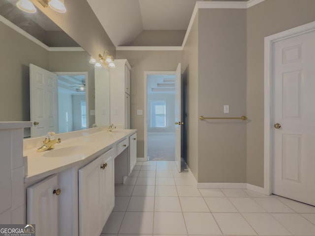 full bathroom with ornamental molding, tile patterned flooring, and a sink