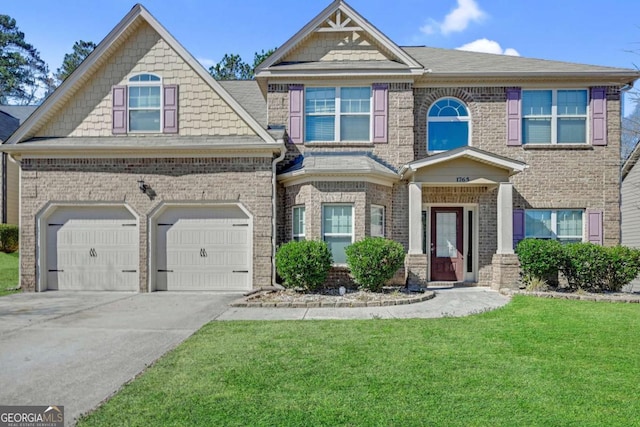 craftsman inspired home with concrete driveway, brick siding, and a front lawn