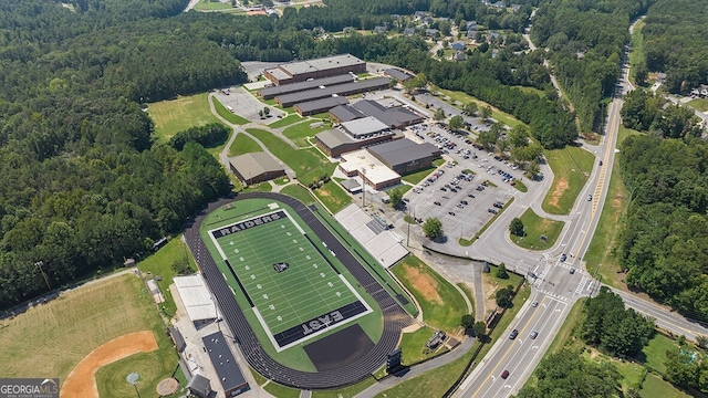 aerial view with a wooded view