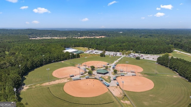 aerial view featuring a wooded view