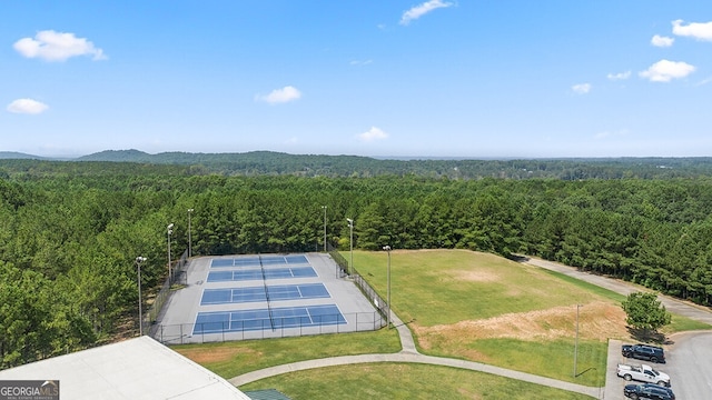 aerial view with a wooded view