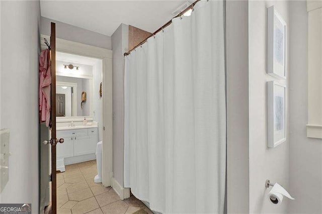 bathroom featuring vanity and tile patterned floors