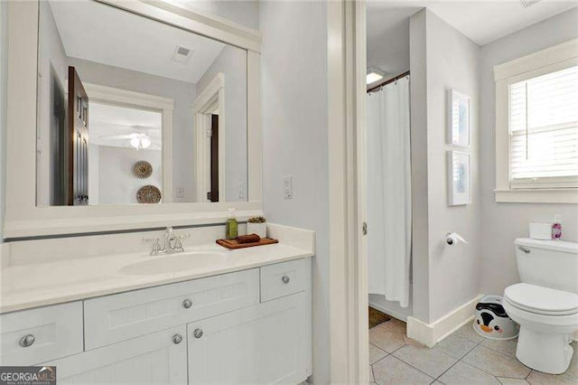 full bathroom featuring tile patterned flooring, toilet, visible vents, vanity, and baseboards