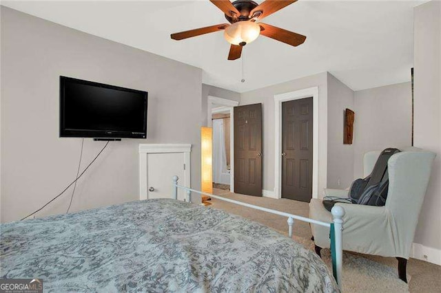 bedroom with carpet and a ceiling fan