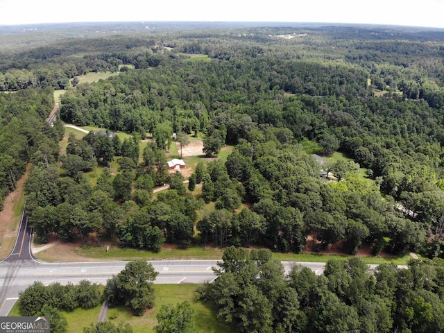 aerial view featuring a forest view