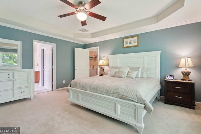 bedroom with crown molding, a raised ceiling, visible vents, light carpet, and baseboards