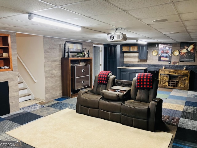 home theater room featuring a paneled ceiling