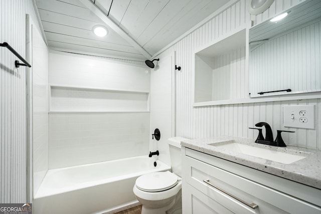 full bathroom with lofted ceiling, shower / washtub combination, vanity, and toilet