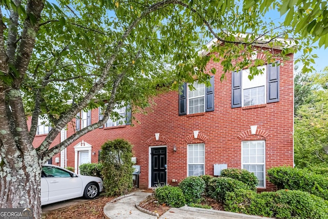 view of front of home with brick siding