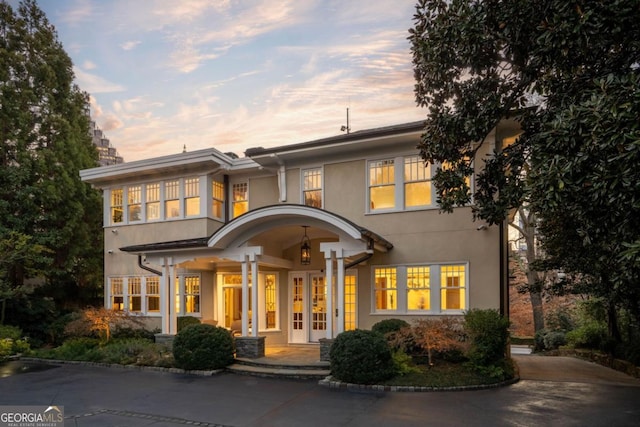 exterior space featuring stucco siding