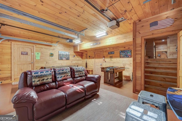 home theater featuring wood ceiling and wooden walls