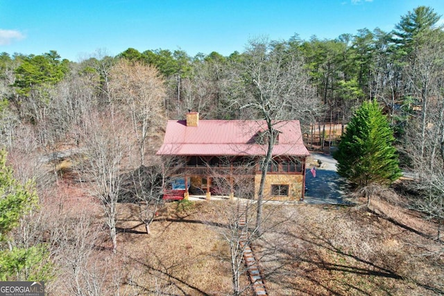 aerial view featuring a forest view