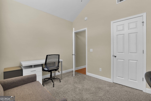 home office with carpet, baseboards, and vaulted ceiling