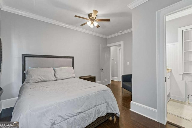 bedroom with baseboards, a ceiling fan, connected bathroom, wood finished floors, and crown molding