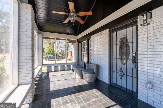 view of patio / terrace featuring ceiling fan and a porch