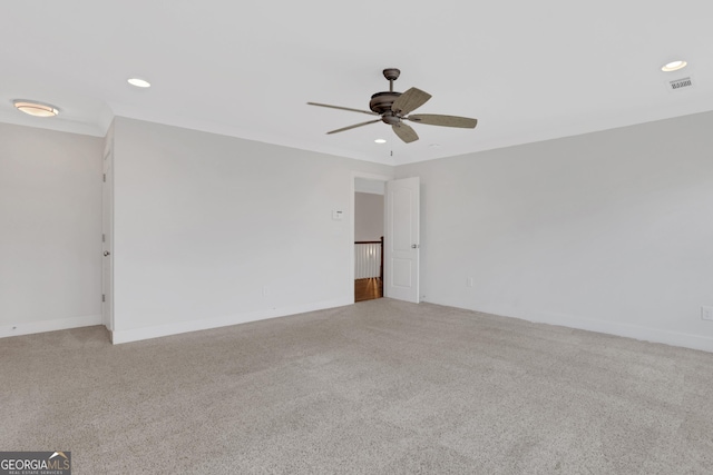 carpeted empty room with recessed lighting, visible vents, ceiling fan, and baseboards