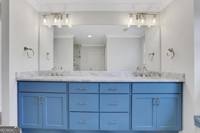 full bathroom featuring crown molding, double vanity, visible vents, a sink, and a shower stall