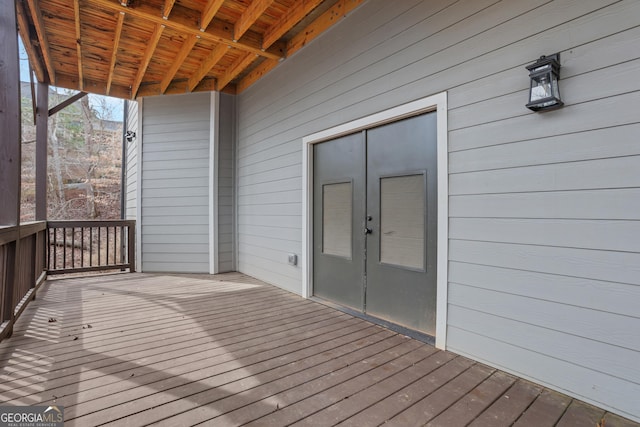 wooden terrace featuring french doors