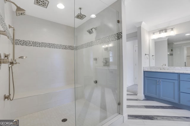 full bathroom featuring recessed lighting, tiled shower, and vanity