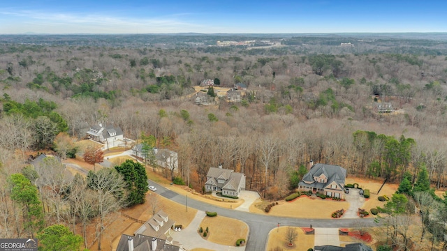 bird's eye view with a view of trees