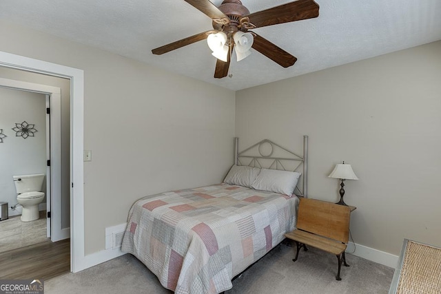 bedroom with visible vents, a ceiling fan, and baseboards