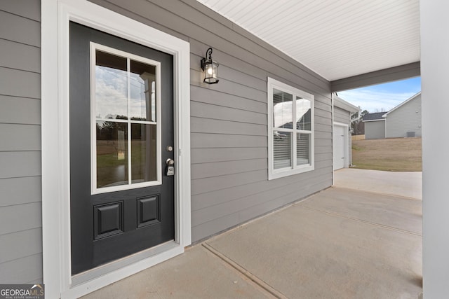 entrance to property with a porch