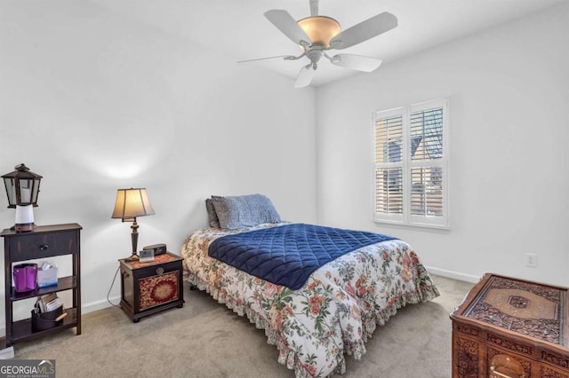 bedroom featuring carpet floors, ceiling fan, and baseboards