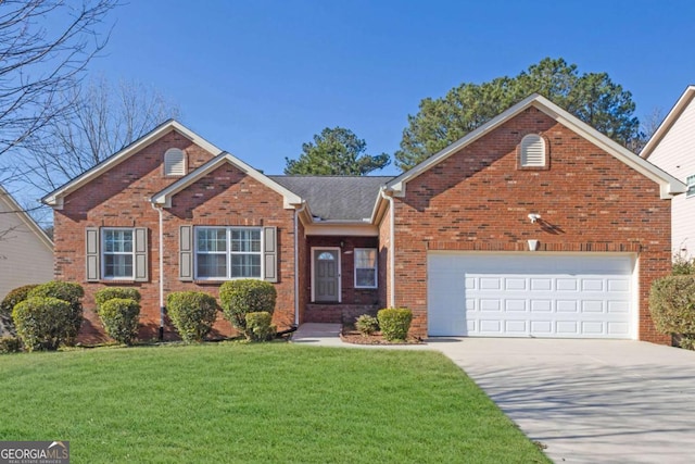 view of front of home featuring driveway, a garage, a front lawn, and brick siding