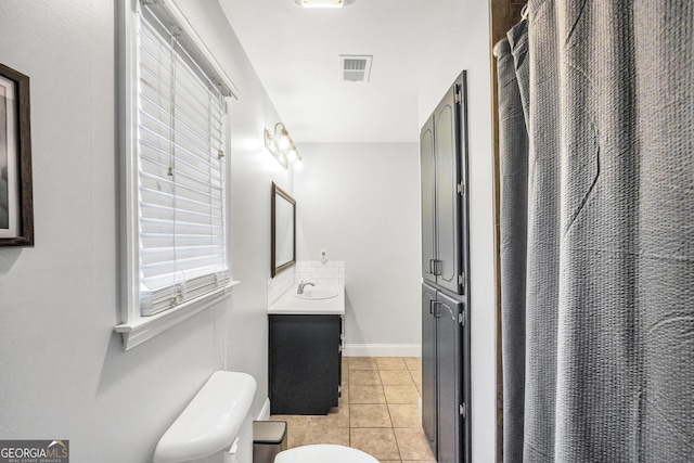 full bath featuring visible vents, baseboards, toilet, tile patterned flooring, and vanity