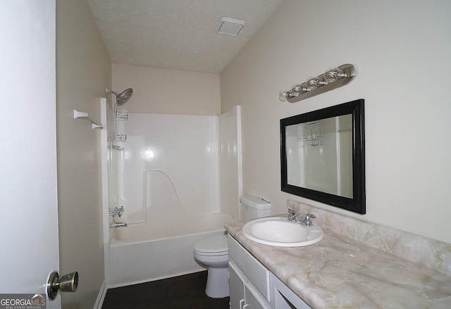 bathroom with visible vents, tub / shower combination, vanity, and toilet