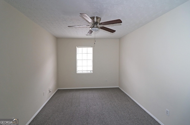 empty room featuring carpet floors, a textured ceiling, baseboards, and a ceiling fan