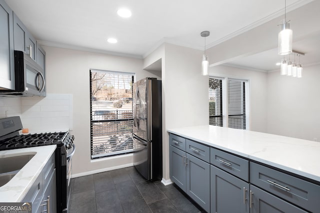 kitchen with appliances with stainless steel finishes, backsplash, light stone countertops, and crown molding